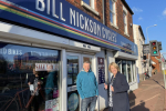 Katherine and owner outside Bill Nickson Cycles