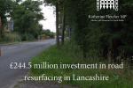 Road with words £244.5 million investment in road resurfacing in Lancashire across it.
