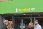 Katherine outside Preston job centre with members of staff