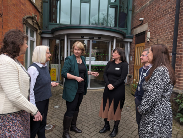 Katherine talking to staff outside the hospice