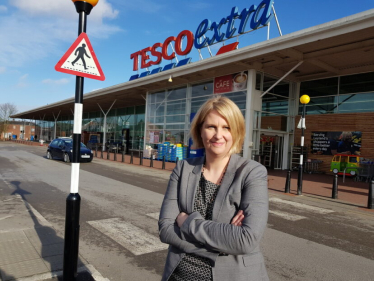 Katherine standing in front of Tesco